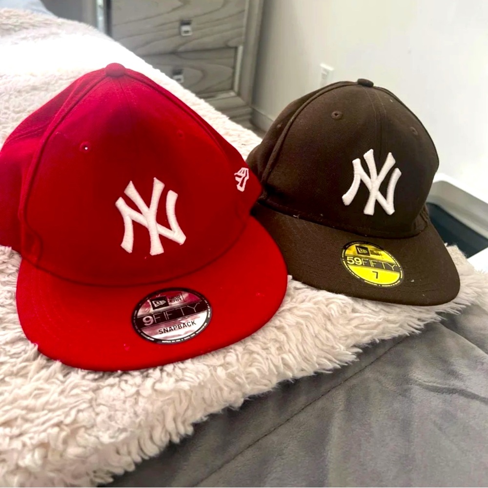 Two yankee hats red and brown